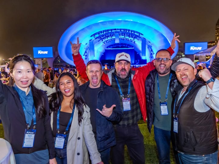 Attendees at outdoor FUTURE party with concert stage