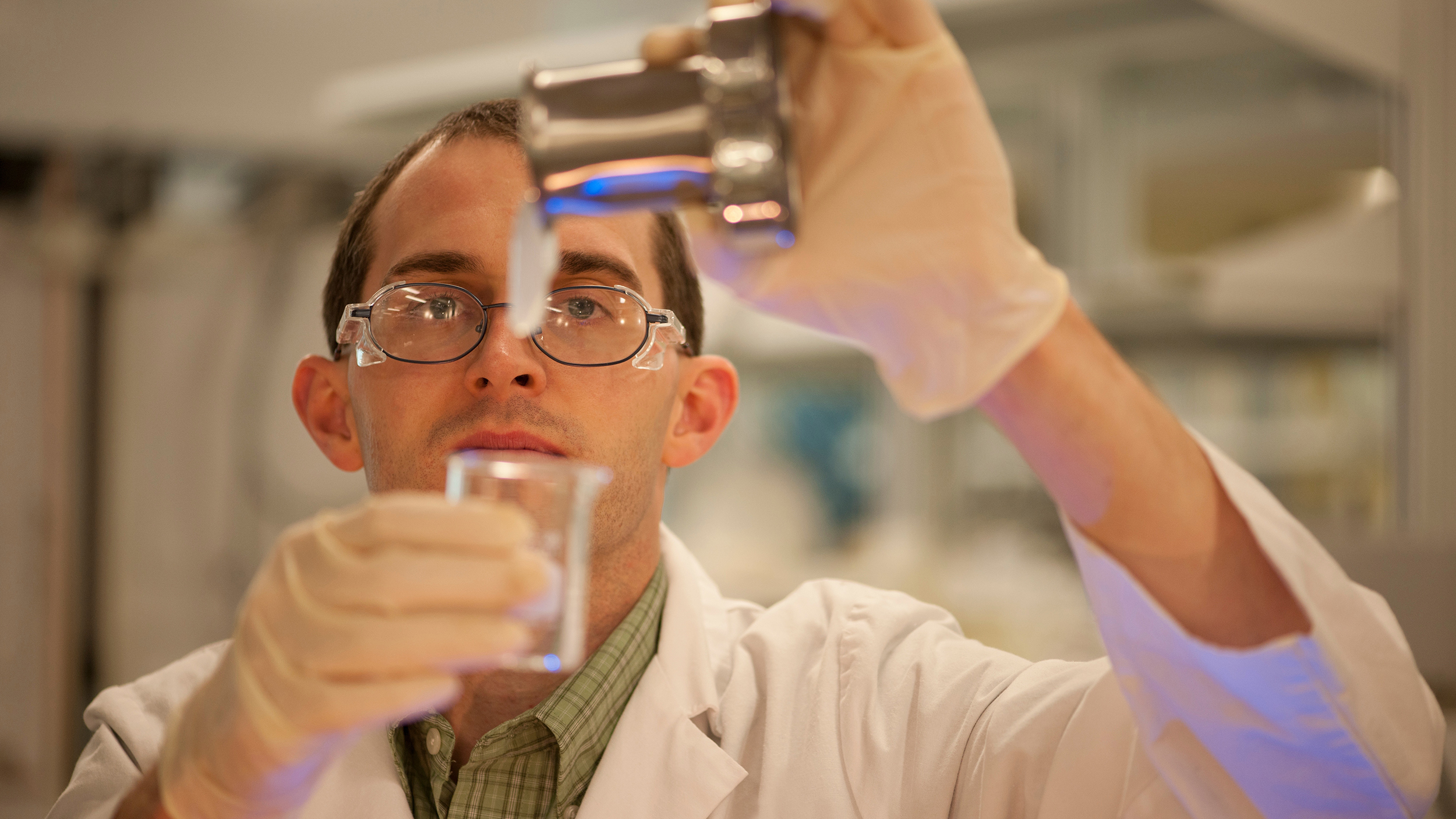 A halliburton engineer testing in lab