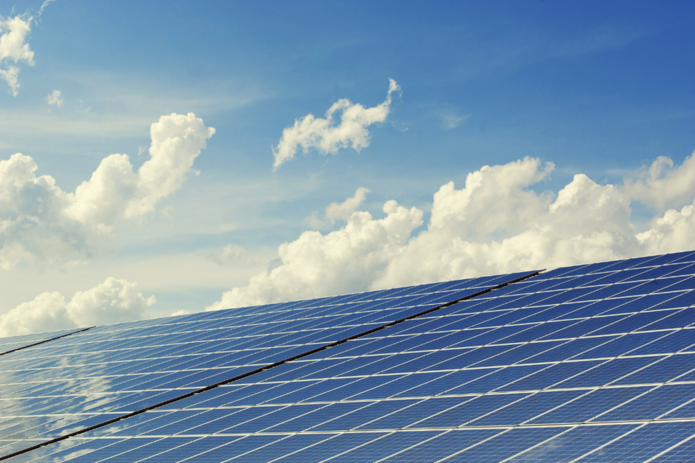 Sustainability: solar panels, blue sky