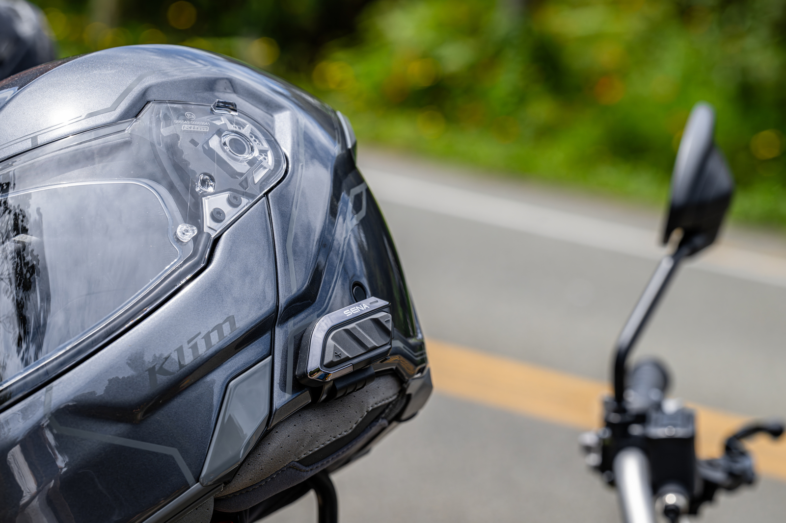 Sena SPIDER X Slim fitted close to the side of a motorcycle helmet