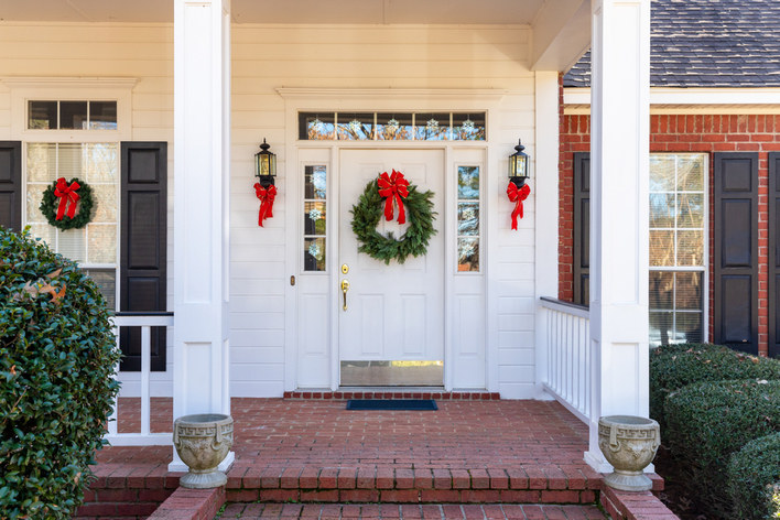 Residential home front door decorated for Christmas