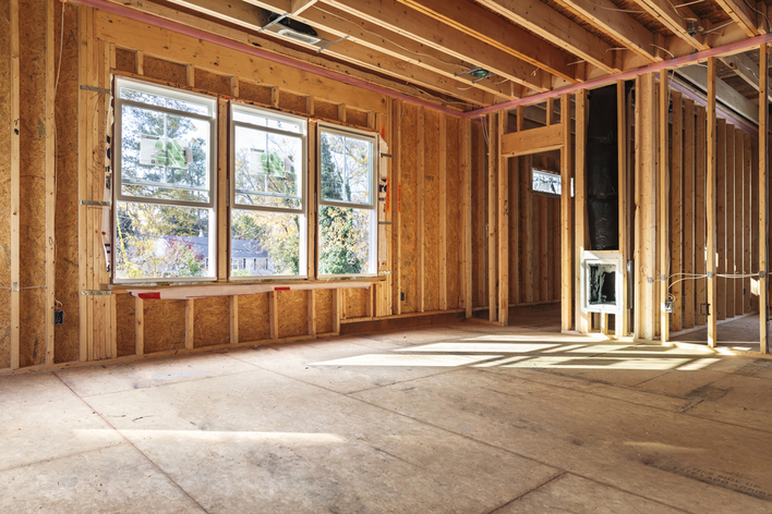 Bare construction of a room awaiting remodeling