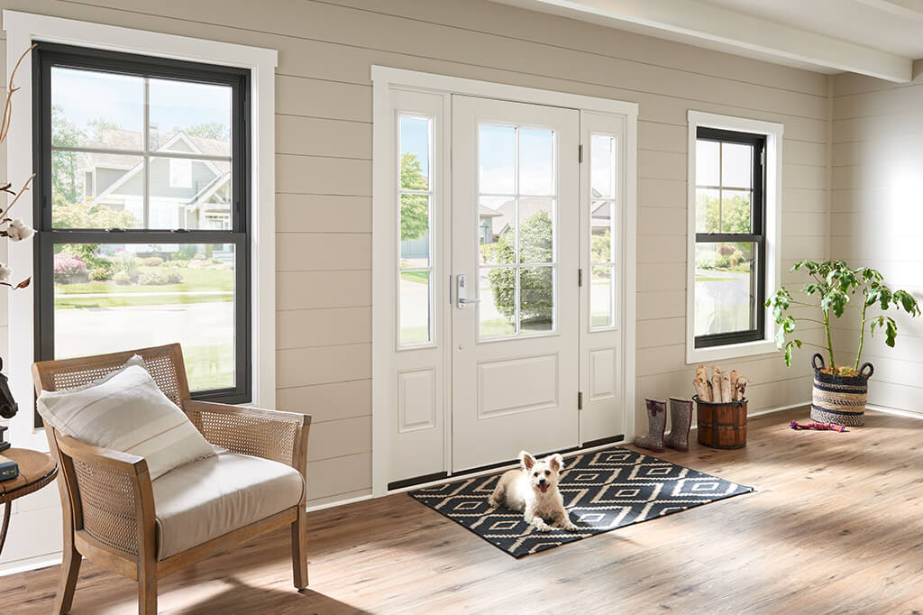 Inside view from of a living room and entry door