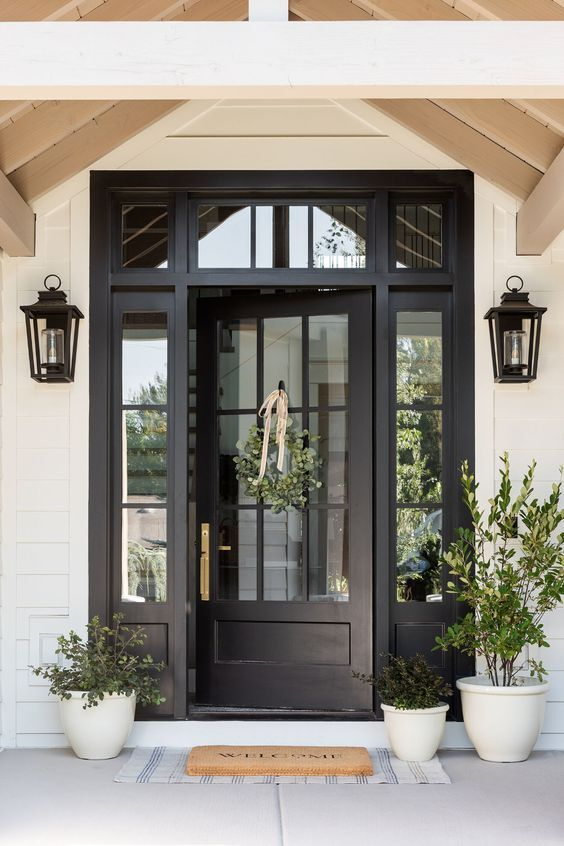 Black entry door with sidelites