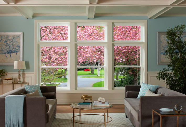 View through living room windows in spring