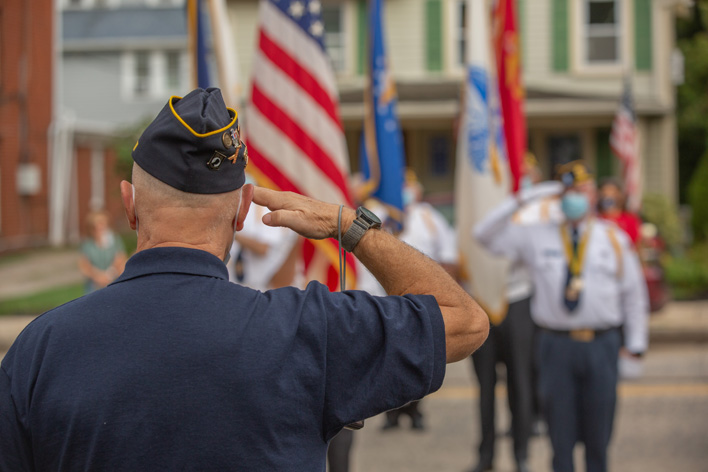 Man saluting the American flag