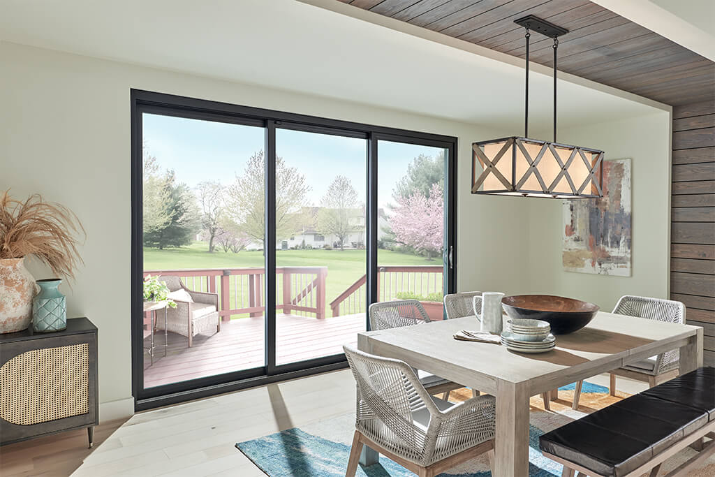 Dining room with large sliding windows