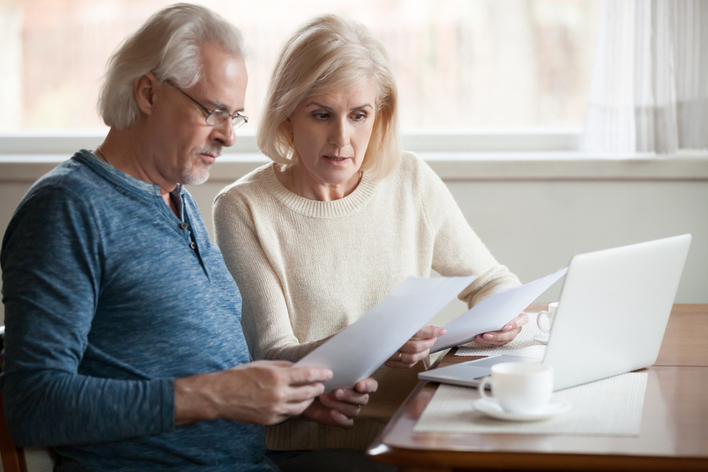 Older couple planning their home energy assessment