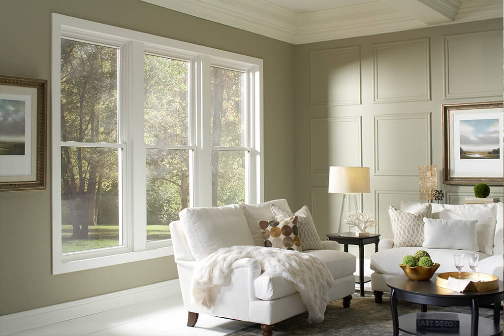 A living room with intricate molding details