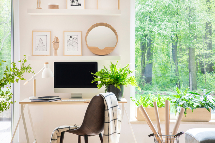 A home office with a beautiful window view