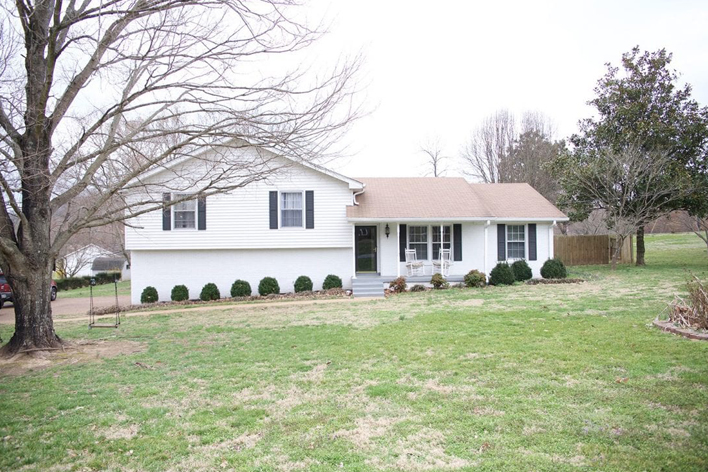 Picture of a white split-level house