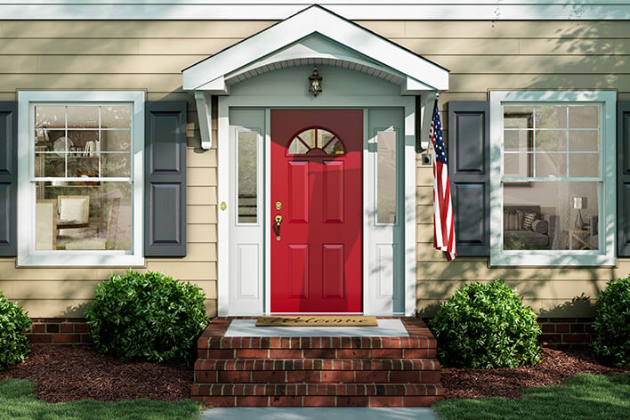 A ranch house remodel with a new red front door