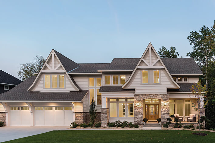 Front of a house with outdoor lighting