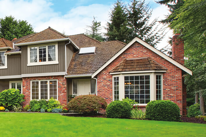 A traditional home showing double-hung style windows