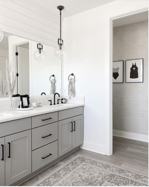 A monochromatic bathroom in gray and white