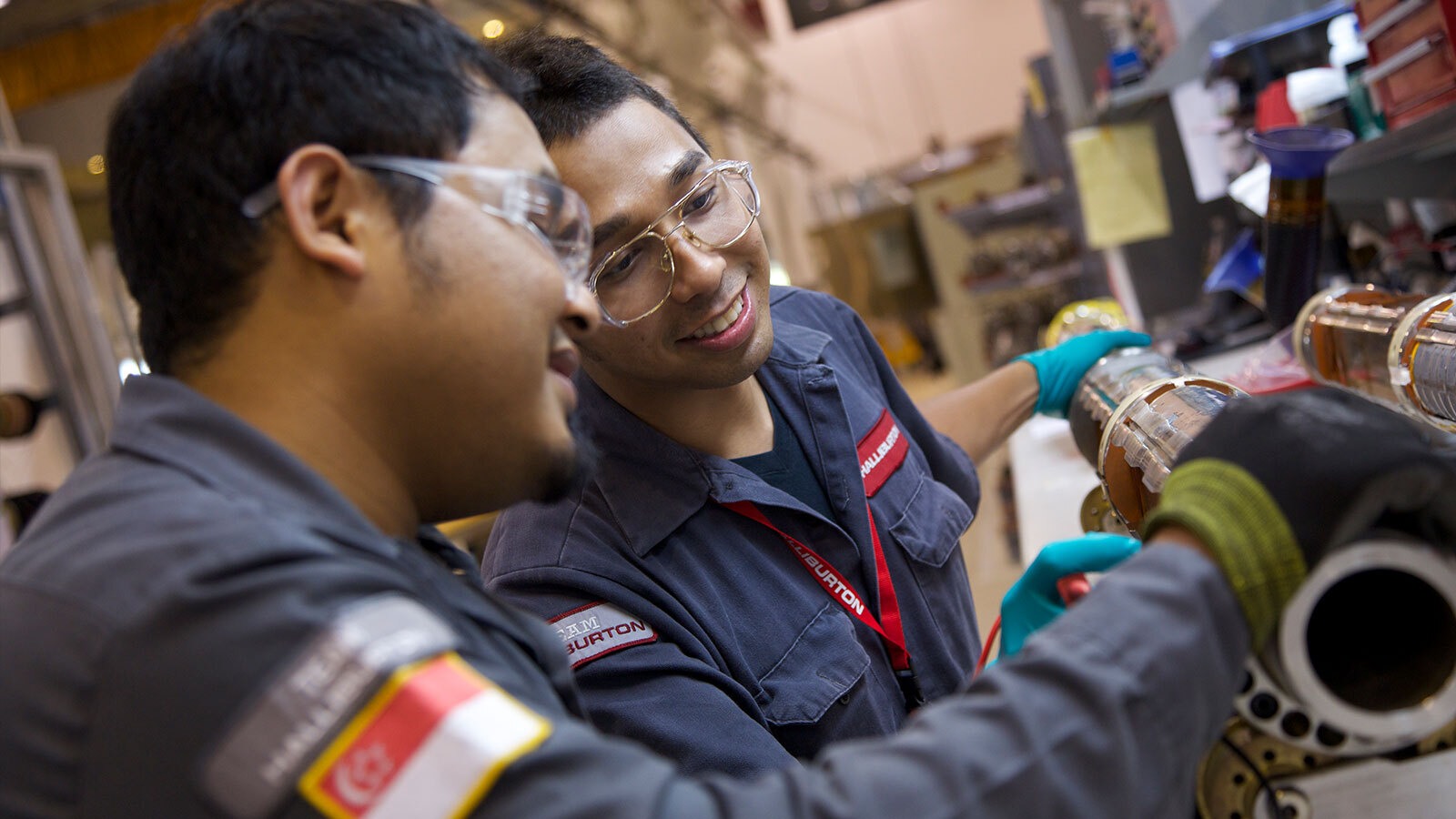 Two Halliburton employees talking