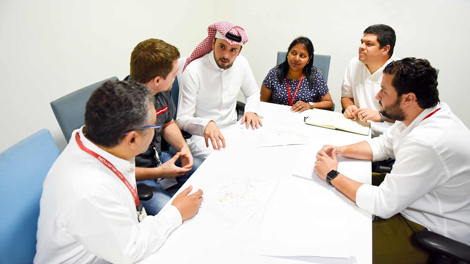 Group of Halliburton employees in a meeting