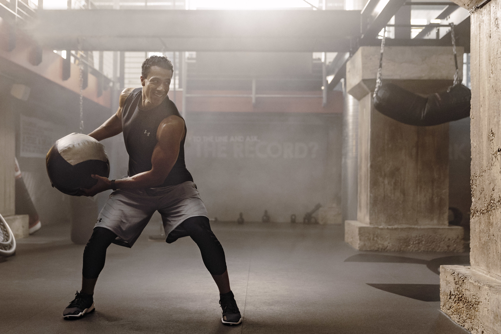 man working out with medicine ball