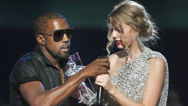 Taylor Swift receiving grammy and Kanye West shooting her down