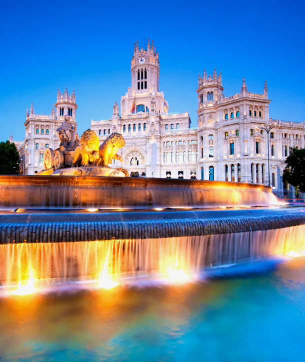 Well-lit fountain in front of architecture on EF's Madrid, Paris & Rome tour.