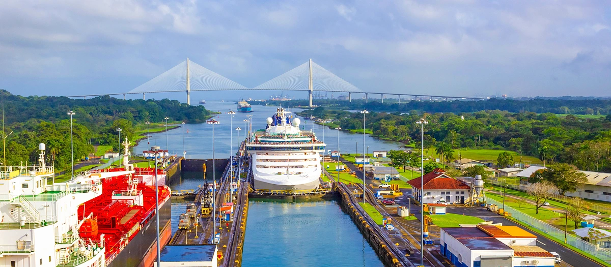 Ships passing through the locks of the Panama Canal on a waterways and wetlands tour.