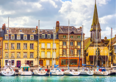 Discover Honfleur, a picturesque coastal village where the Seine River meets the English Channel