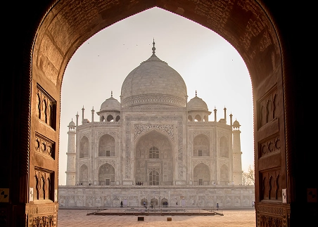 Stand before the Taj Mahal in Agra, admiring the stunning architectural details up close and learning about its history as a UNESCO World Heritage Site