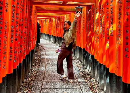Walk through the long tunnel of torii gates at the Fushimi Inari-taisha shrine and learn about the role of Shinto traditions in Japanese life