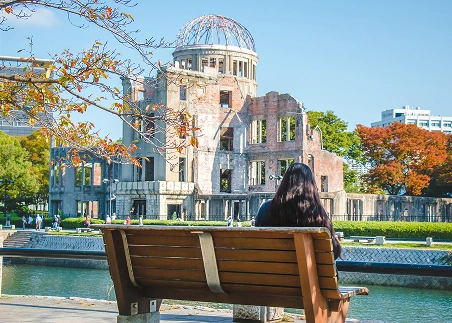 Pause for reflection at Hiroshima's Peace Memorial and Museum, exploring personal accounts of loss and survival after the atomic bombing during WWII