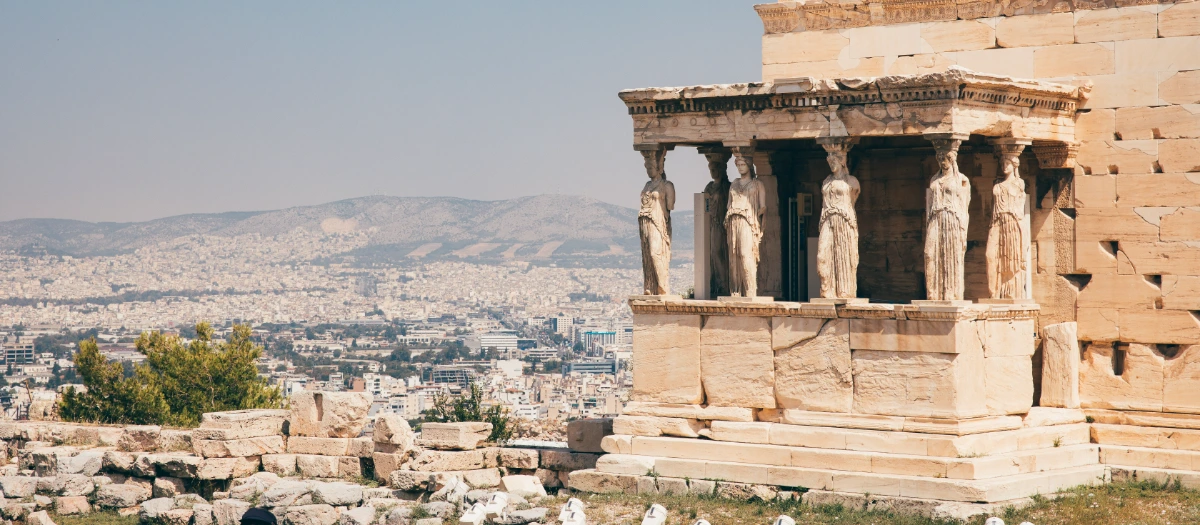 Caryatid statues of the Erechtheion above Athens on a middle school trip to Greece.