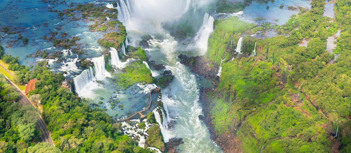 Iguazu Falls cascading through rainforest seen from above on the Viva Argentina student tour.