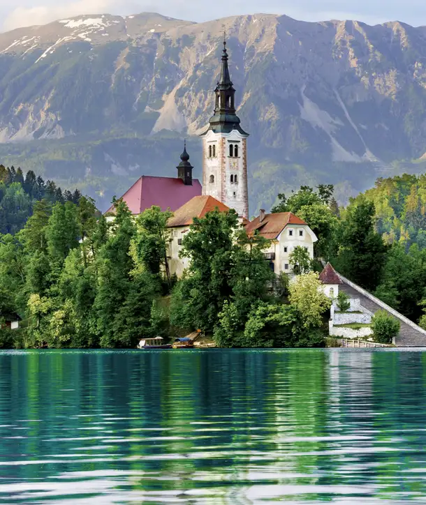 Church with mountain in background on Croatia & Slovenia tour.