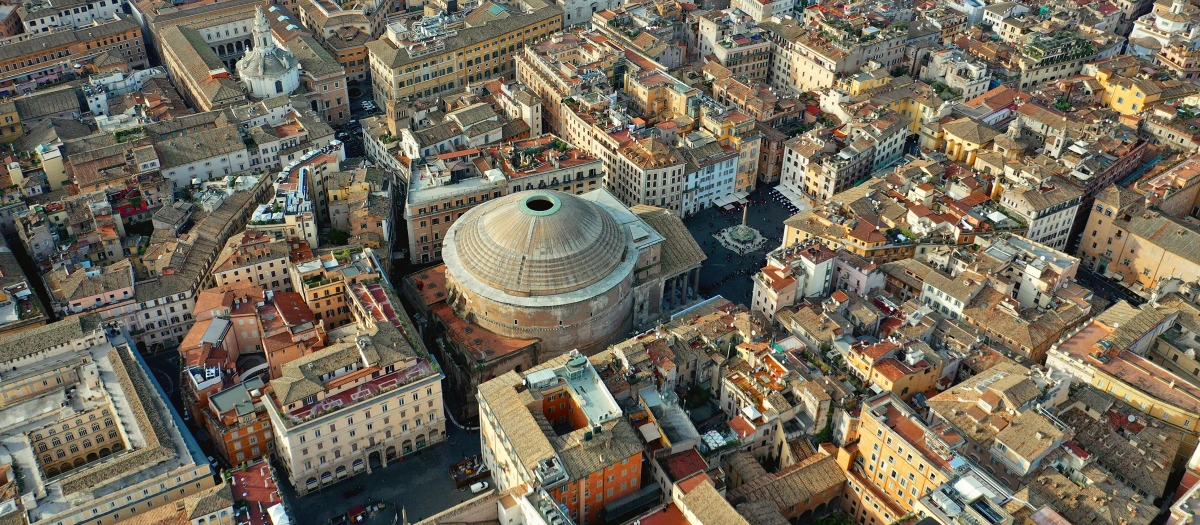 Pantheon dome seen from above among the rooftops of Rome on a Rome and Athens student tour.