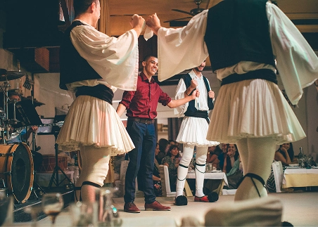 Follow the rhythm during a dance lesson, a lively tradition at the heart of Greek culture