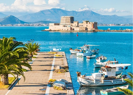 Sail around Nafplio Bay and dock to explore one of Greece’s most charming seaside towns