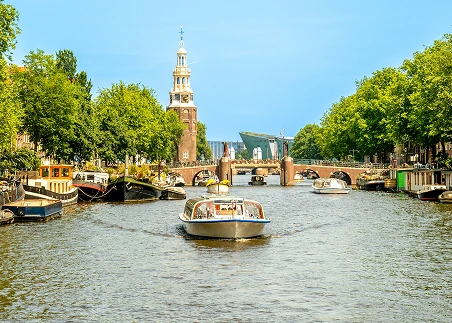Cruise through Amsterdam’s UNESCO-listed canals and learn how the city’s waterways shaped history, trade, and daily life