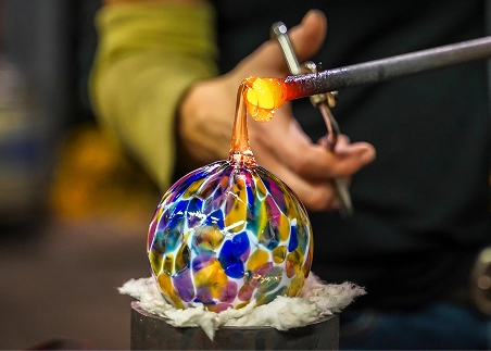 Watch master artisans at work during a Venetian glass-blowing demonstration