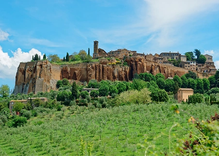 Ride a funicular up to Orvieto and discover a charming Umbrian gem perched dramatically above the countryside