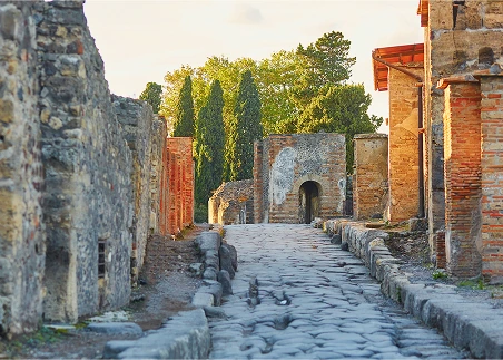 Step into Pompeii, where daily life was paused in place when Mount Vesuvius erupted in 79 AD