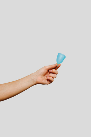 blue menstrual cup by Anna Shvets