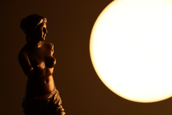 silhouette of a female statue
