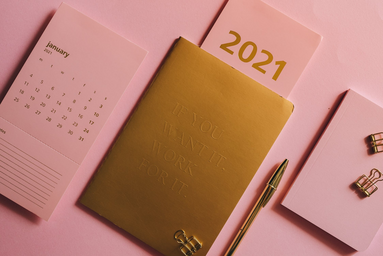 pink background with gold 2021 planner