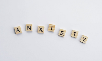 Scrabble tiles that spell anxiety.