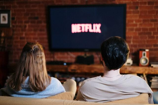 two people watching Netflix