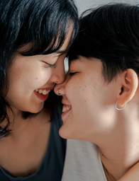 man and woman smiling