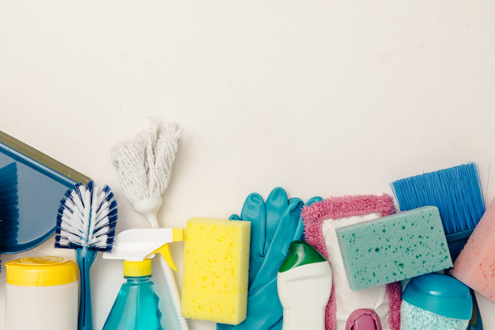 cleaning supplies flatlay by Shopify Partners