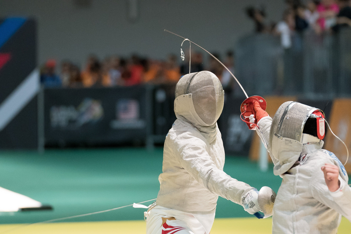 two fencers in a dual by Eugene Lim