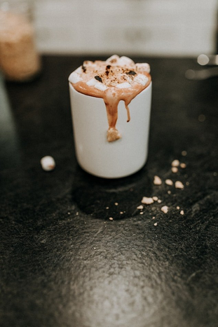 hot chocolate in mug by Kreated Media