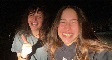 Two girls laughing in a selfie