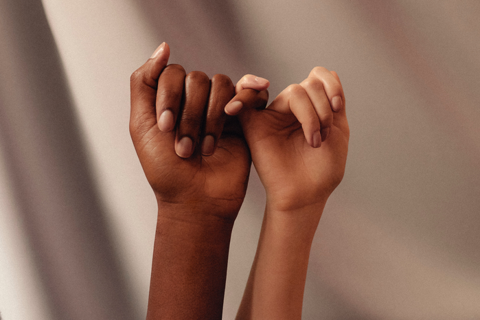 pinky promise by Womanizer WOW Tech on Unsplash